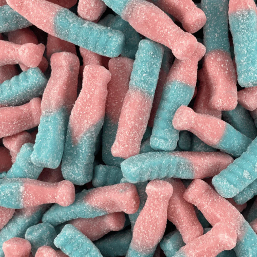 Close-up of pink and blue gummy bottles.