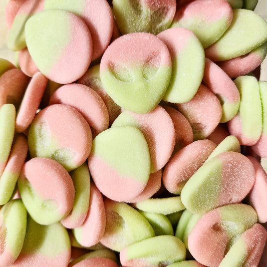 Close-up of pink and green candy buttons