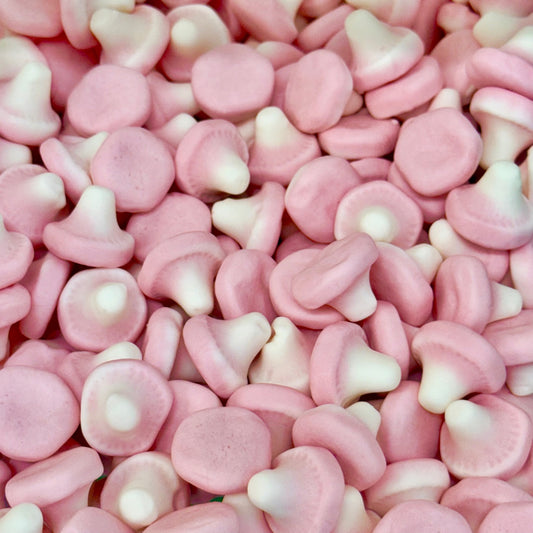 Close-up of pink and white heart-shaped candies.